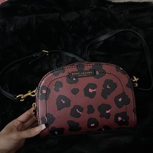 Brand: MARC JACOBS, Style: crossbody purse, Colors: burgundy, pink, black.
